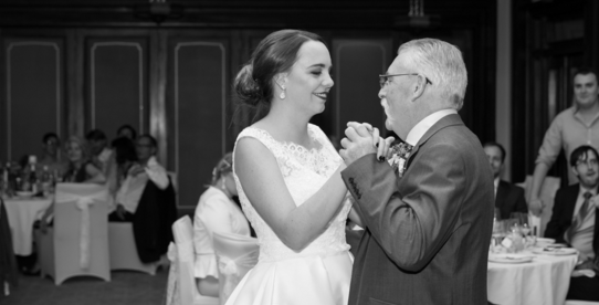 Father and daughter first dance black and white